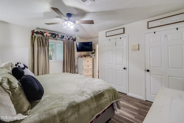 730 Holly Hills Dr, Biloxi, MS 39532 - bedroom with dark wood-style flooring and ceiling fan