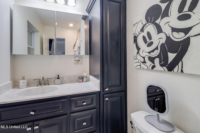 730 Holly Hills Dr, Biloxi, MS 39532 - bathroom with vanity and toilet