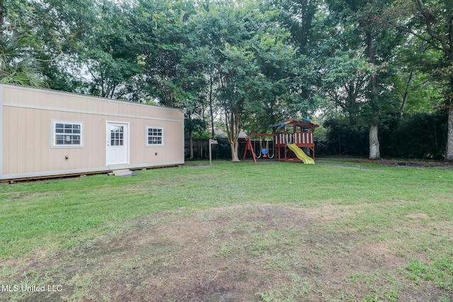 730 Holly Hills Dr, Biloxi, MS 39532 - view of yard featuring a playground and an outbuilding