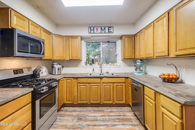 730 Holly Hills Dr, Biloxi, MS 39532 - kitchen with appliances with stainless steel finishes and light wood-type flooring