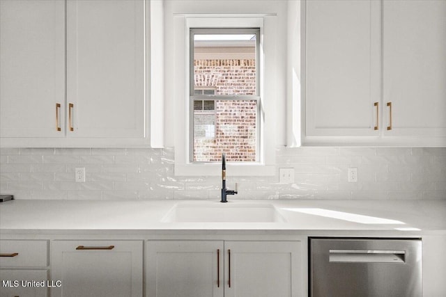 113 Water St, Madison, MS 39110 - kitchen with dishwasher, a sink, white cabinets, and plenty of natural light