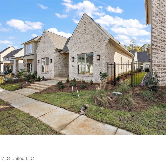 113 Water St, Madison, MS 39110 - view of front of house featuring brick siding