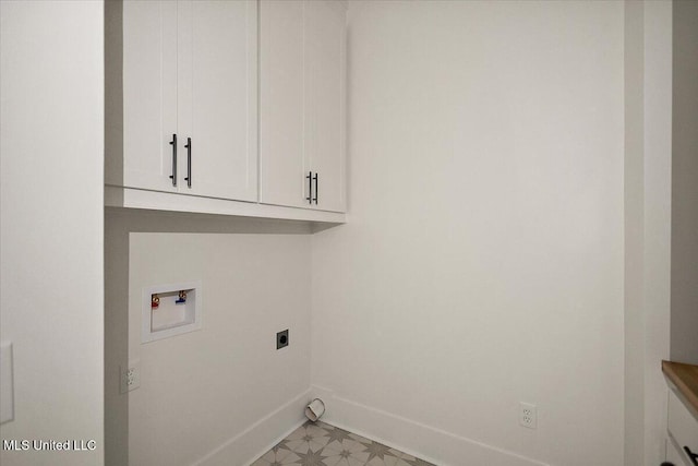 113 Water St, Madison, MS 39110 - laundry area featuring hookup for an electric dryer, baseboards, washer hookup, and cabinet space