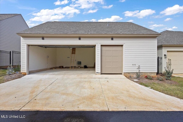 113 Water St, Madison, MS 39110 - garage featuring fence and concrete driveway