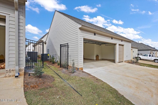 113 Water St, Madison, MS 39110 - garage with fence and cooling unit