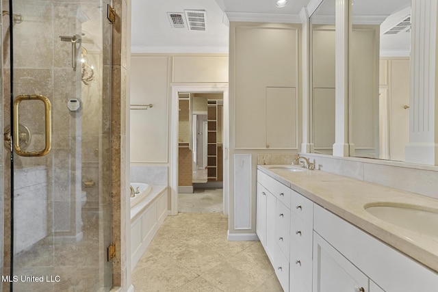 bathroom with crown molding, vanity, and plus walk in shower