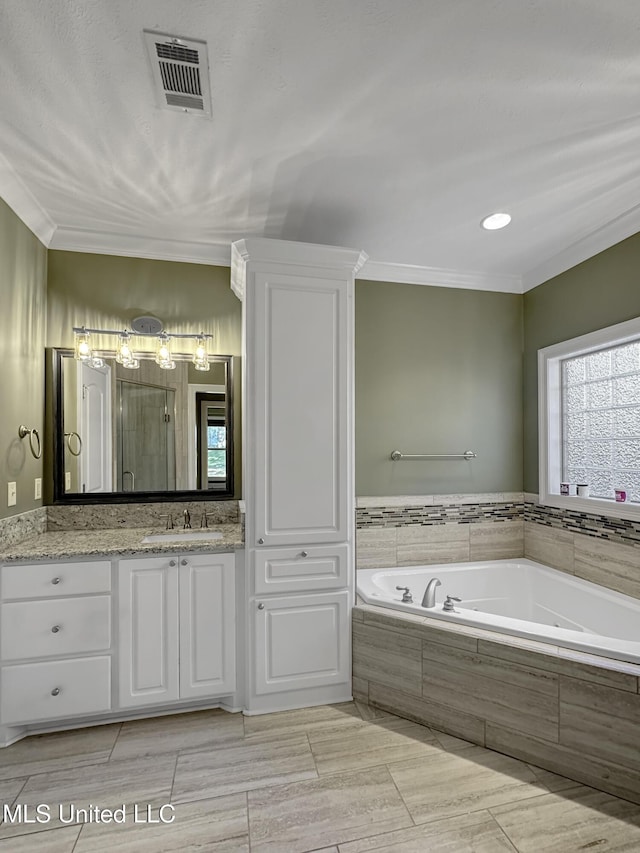 214 Terrapin Creek Rd, Brandon, MS 39042 - full bathroom with a bath, vanity, crown molding, and a stall shower