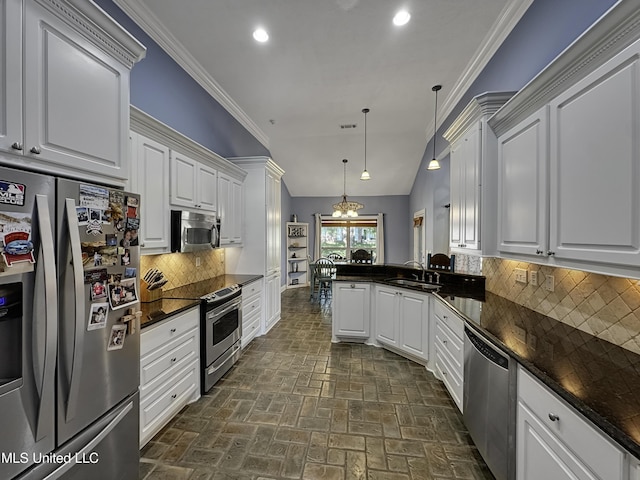 214 Terrapin Creek Rd, Brandon, MS 39042 - kitchen featuring appliances with stainless steel finishes, a sink, a peninsula, recessed lighting, and white cabinets