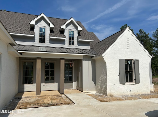 view of front of home featuring a patio