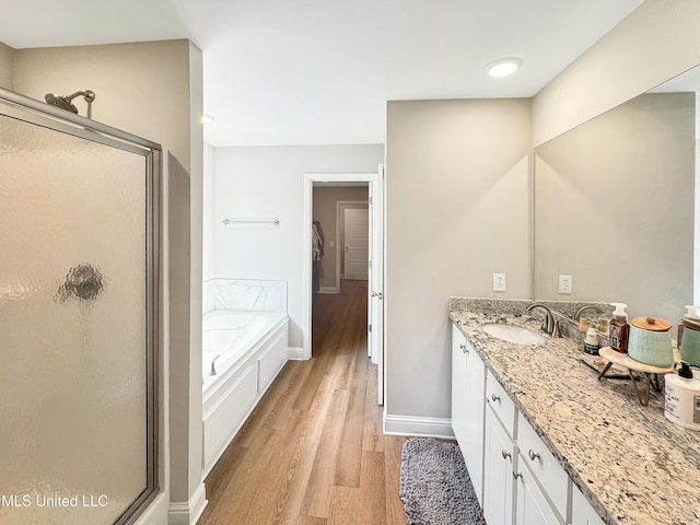 708 Silver Bnd, Pearl, MS 39208 - full bath with a stall shower, wood finished floors, vanity, and a bath