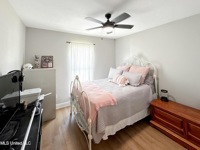 708 Silver Bnd, Pearl, MS 39208 - bedroom with light wood finished floors and ceiling fan