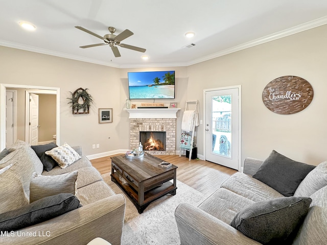 708 Silver Bnd, Pearl, MS 39208 - living room featuring ornamental molding, wood finished floors, ceiling fan, a brick fireplace, and recessed lighting
