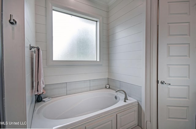 bathroom featuring a bath