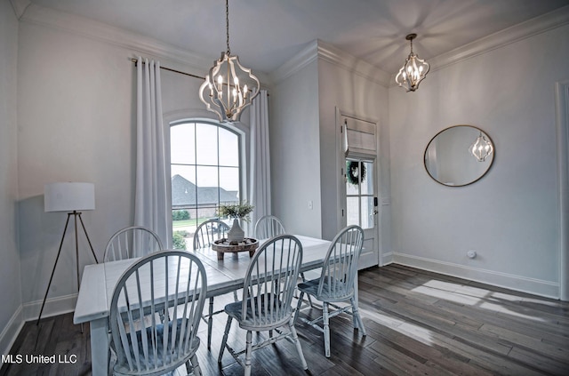 dining room with a chandelier, baseboards, crown molding, and dark wood-style floors