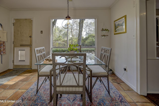 dining room with ornamental molding