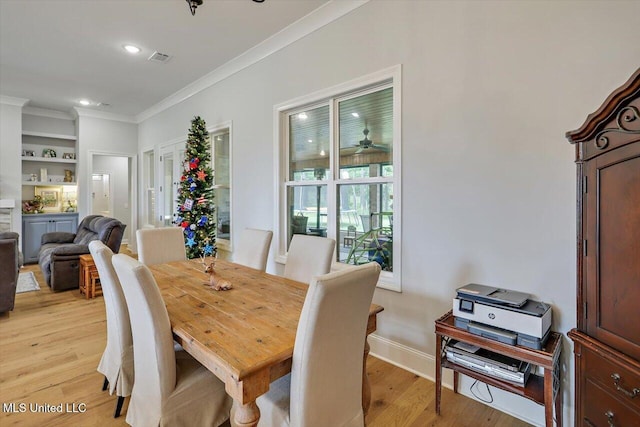 221 Lost Oak Ln, Brandon, MS 39047 - dining space with crown molding, light wood-type flooring, recessed lighting, and baseboards