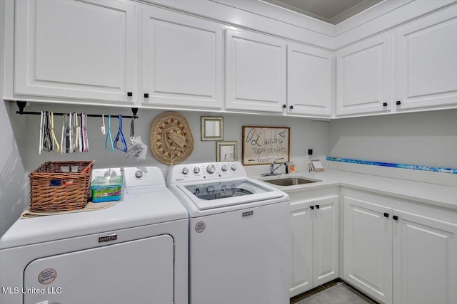 221 Lost Oak Ln, Brandon, MS 39047 - laundry area featuring cabinet space and washing machine and clothes dryer
