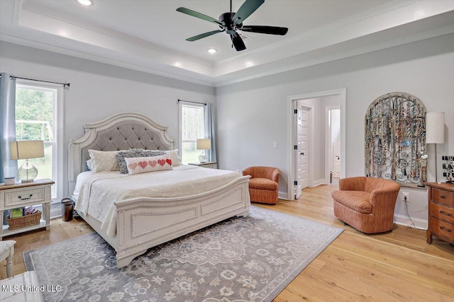 221 Lost Oak Ln, Brandon, MS 39047 - bedroom with a tray ceiling, wood finished floors, recessed lighting, a ceiling fan, and baseboards
