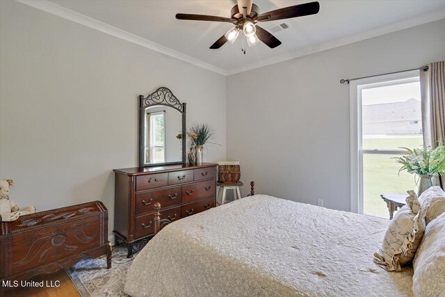 221 Lost Oak Ln, Brandon, MS 39047 - bedroom featuring crown molding, wood finished floors, and a ceiling fan
