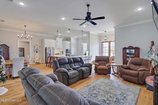 221 Lost Oak Ln, Brandon, MS 39047 - living room with a ceiling fan, a chandelier, ornamental molding, light wood-style floors, and recessed lighting