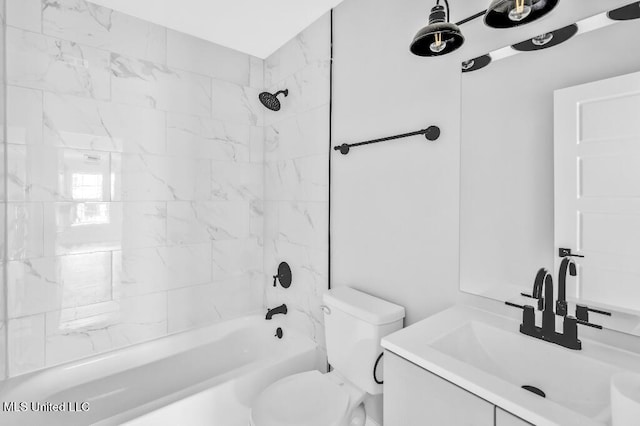bathroom featuring toilet, shower / bath combination, and vanity