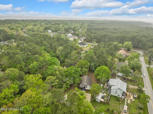 bird's eye view featuring a forest view
