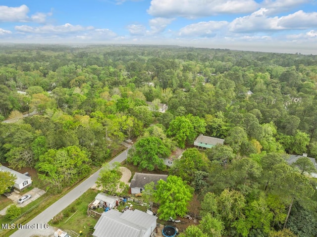 aerial view with a wooded view