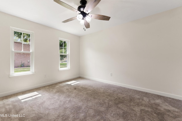 3106 Breezy Hill Ln, Ocean Springs, MS 39564 - carpeted empty room with baseboards and a ceiling fan