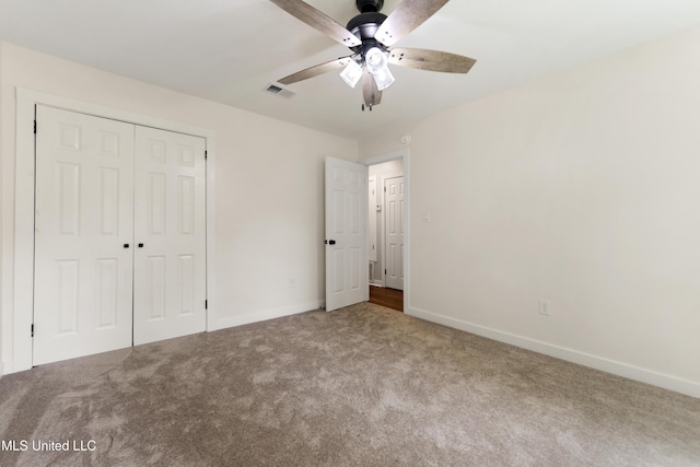 3106 Breezy Hill Ln, Ocean Springs, MS 39564 - unfurnished bedroom with carpet floors, a closet, and a ceiling fan