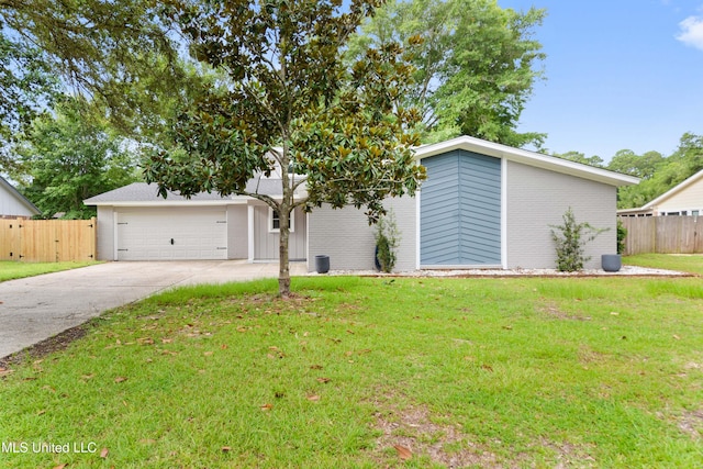 3106 Breezy Hill Ln, Ocean Springs, MS 39564 - mid-century modern home with driveway and an attached garage