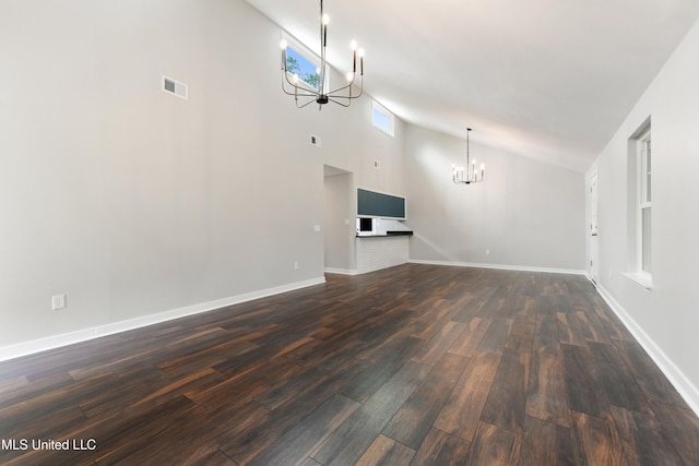 3106 Breezy Hill Ln, Ocean Springs, MS 39564 - unfurnished living room featuring a chandelier, dark wood finished floors, and high vaulted ceiling