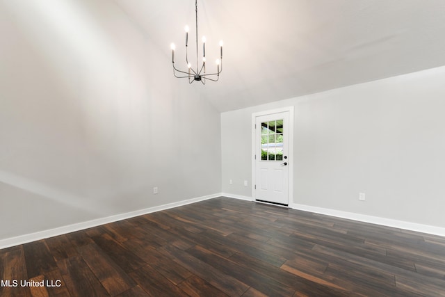3106 Breezy Hill Ln, Ocean Springs, MS 39564 - unfurnished dining area with a chandelier, dark wood-style flooring, and high vaulted ceiling