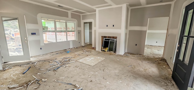 unfurnished living room with visible vents