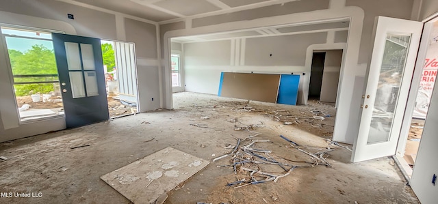 unfurnished living room with a wealth of natural light