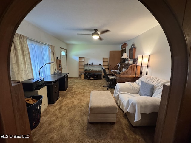15708 Orleans Dr, Biloxi, MS 39532 - living room featuring arched walkways, carpet floors, and ceiling fan