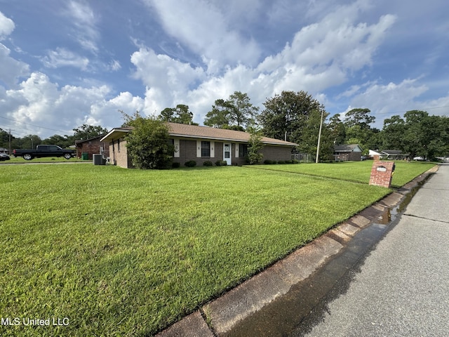 15708 Orleans Dr, Biloxi, MS 39532 - ranch-style home with a front yard and brick siding