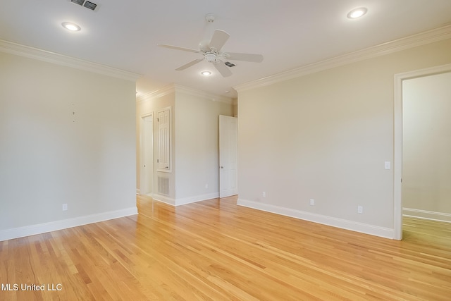 empty room with ceiling fan, light wood-type flooring, and ornamental molding