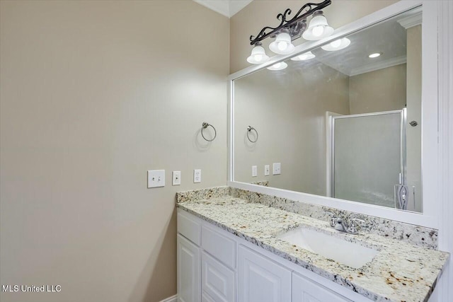 bathroom featuring vanity and a shower stall