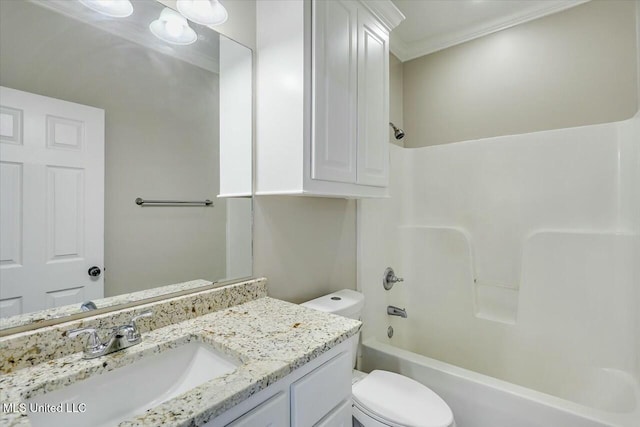 full bath featuring ornamental molding, tub / shower combination, vanity, and toilet