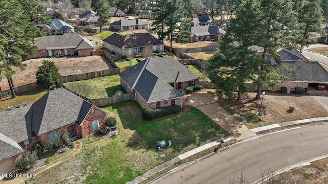 birds eye view of property with a residential view