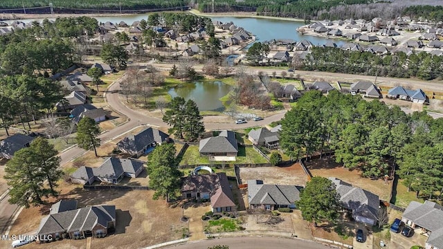 aerial view with a residential view and a water view