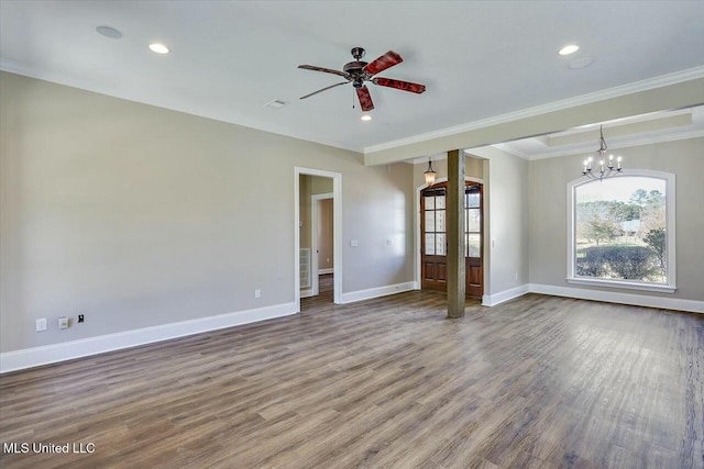 empty room featuring crown molding, recessed lighting, wood finished floors, baseboards, and ceiling fan with notable chandelier