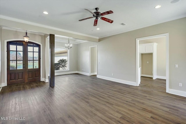 entryway featuring french doors, dark wood-style flooring, crown molding, visible vents, and baseboards