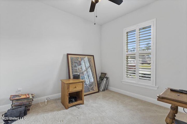 miscellaneous room featuring ceiling fan, baseboards, and carpet flooring