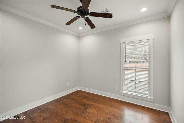 spare room with dark hardwood / wood-style flooring, crown molding, and ceiling fan