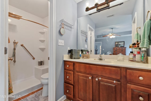 2301 Paula Cir, Ocean Springs, MS 39564 - full bath featuring a stall shower, vanity, and a ceiling fan