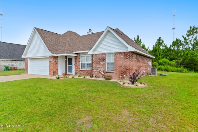 2301 Paula Cir, Ocean Springs, MS 39564 - view of front of property featuring brick siding, concrete driveway, a front yard, an attached garage, and a shingled roof