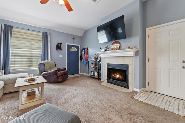 2301 Paula Cir, Ocean Springs, MS 39564 - living room with carpet flooring, ceiling fan, lofted ceiling, healthy amount of natural light, and a tiled fireplace