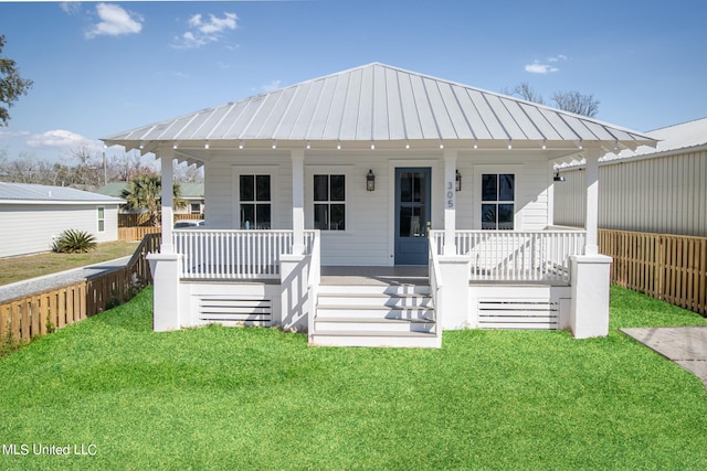 view of front of home with a front lawn and covered porch