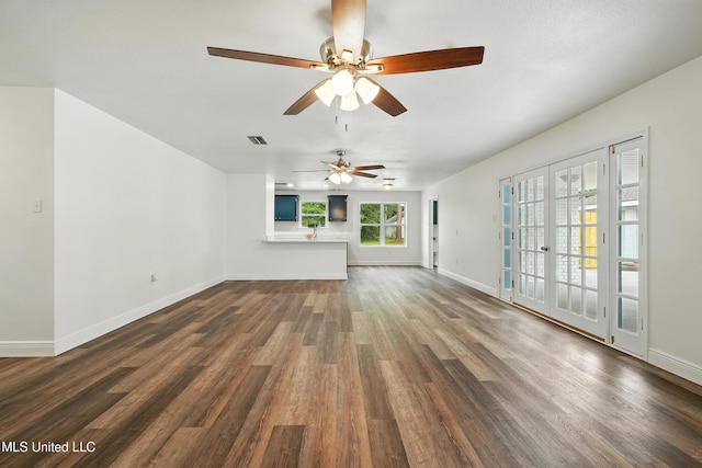 611 E E Lakeshore Dr, Carriere, MS 39426 - unfurnished living room with ceiling fan and dark wood-type flooring